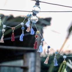 Return To Sender Slinger Met Kwastjes -Duurzamer-speelgoed Winkel 550x366 73