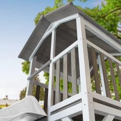 AXI Beach Tower Speeltoestel In Grijs/Wit - Speeltoren Met Zandbak En Witte Glijbaan - FSC Hout - Speelhuis Op Palen Voor De Tuin -Duurzamer-speelgoed Winkel 550x550 537